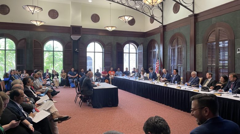 A nice room at the UT RGV Brownsville campus set up for a hearing of the Texas House Committee on Transportation. The committee is to the right chaired by Terry Canales and the crowd is to the left, with TxDOT CEO Marc Williams sitting at the witness table facing the committee.